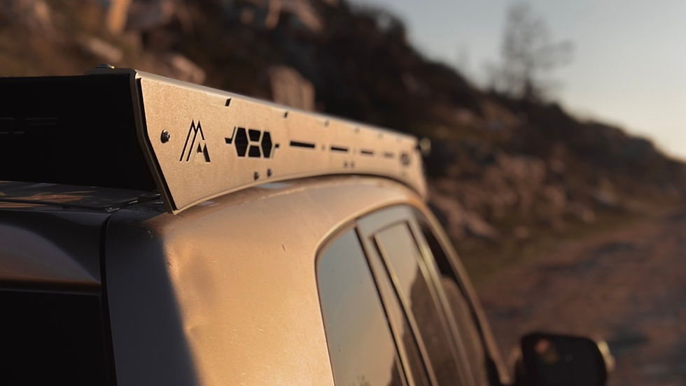 Mountain Movers aluminum roof rack on a 4x4 SUV, showcasing custom side plate design and off road build quality.