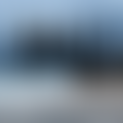 Moody beach scene during rainy season in Bali with dark storm clouds