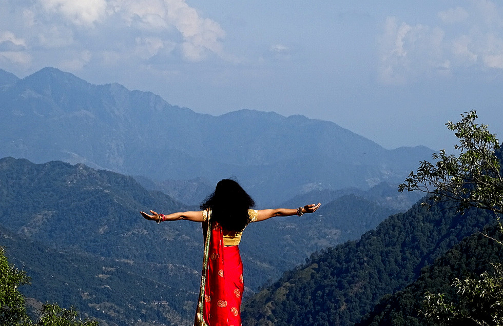 200 hour yoga teacher training class practicing asanas with instructor guidance