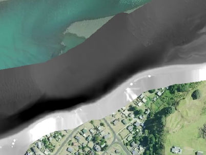 MĀKI autonomous survey vessel and DJI drone conducting topo-bathymetric mapping at Aotea Harbour for Ōtorohanga District Council.