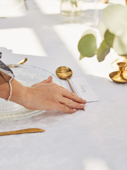 Setting table for wedding dinner