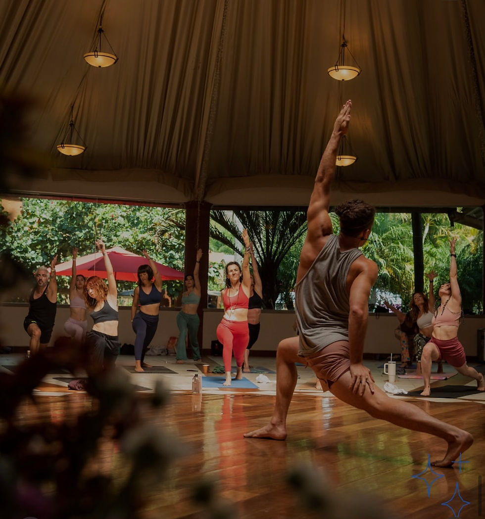 Group practicing yoga at La Buena Vibra, the serene setting of the Turning Point wellness retreat