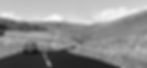 a classic car on a country road