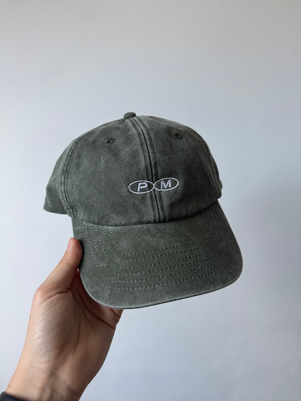 Thumbnail: 'PM' cap