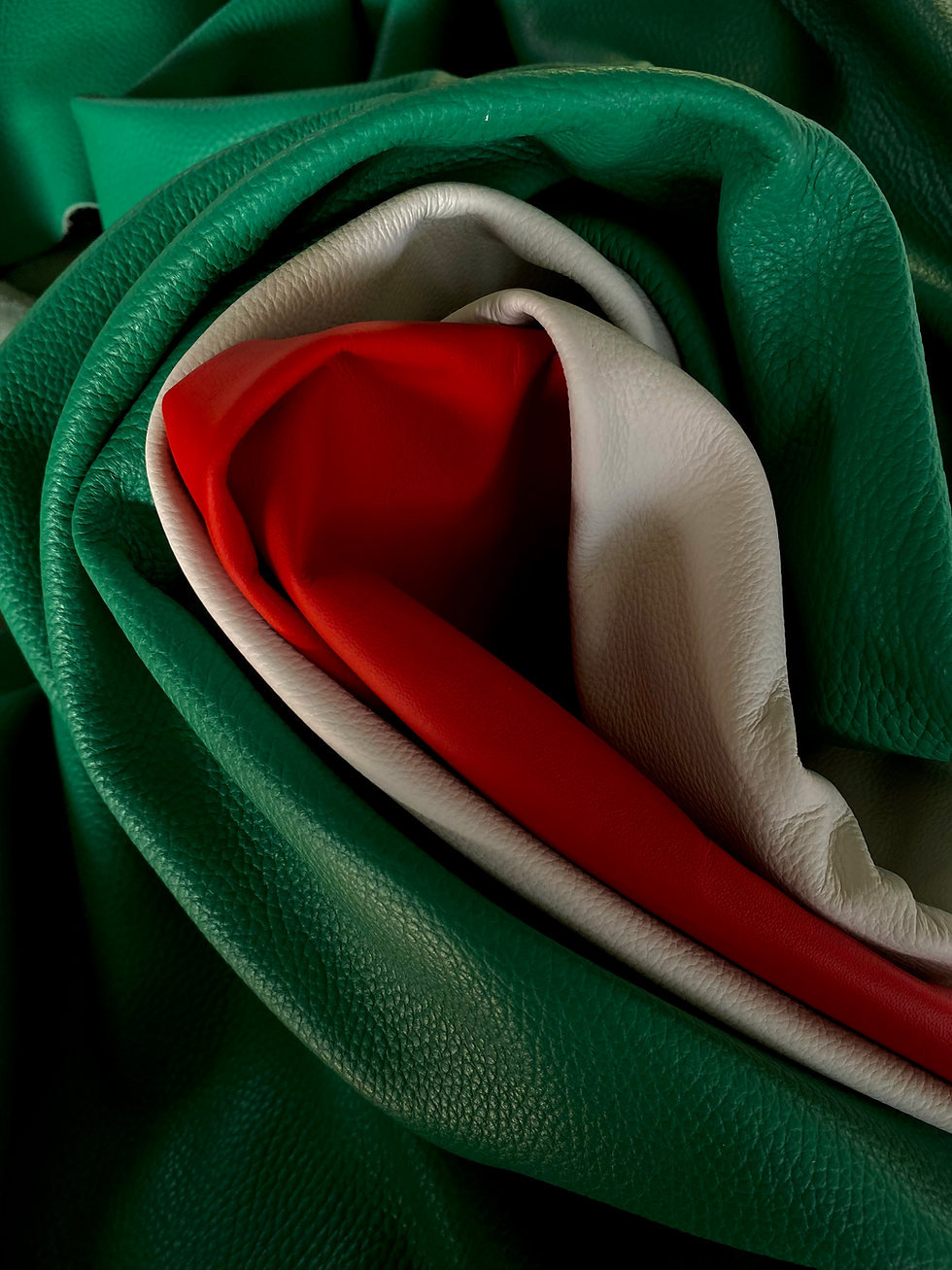 Green, white and red Leathers made in Tirrena Leather Processing, tanning company based in Lonigo (V
