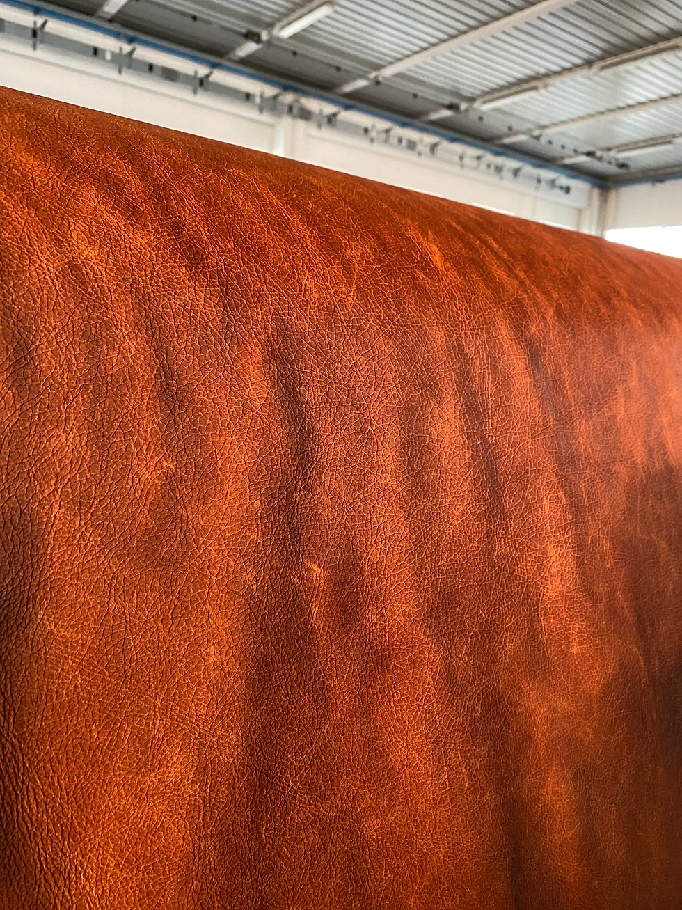 The orange brown leather created by Tirrena Leather Processing, a tannery based in Lonigo (VI)