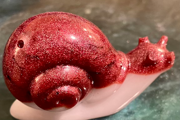 Thumbnail: Red and white snail decoration