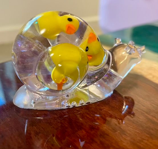 Thumbnail: Clear solid resin snail with duckies