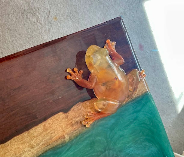 Thumbnail: resin frog on resin river table