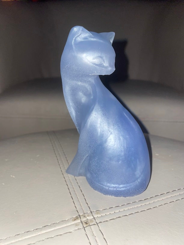 white cat sculpture