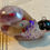 Thumbnail: Snail decoration with purple coloring and white rock