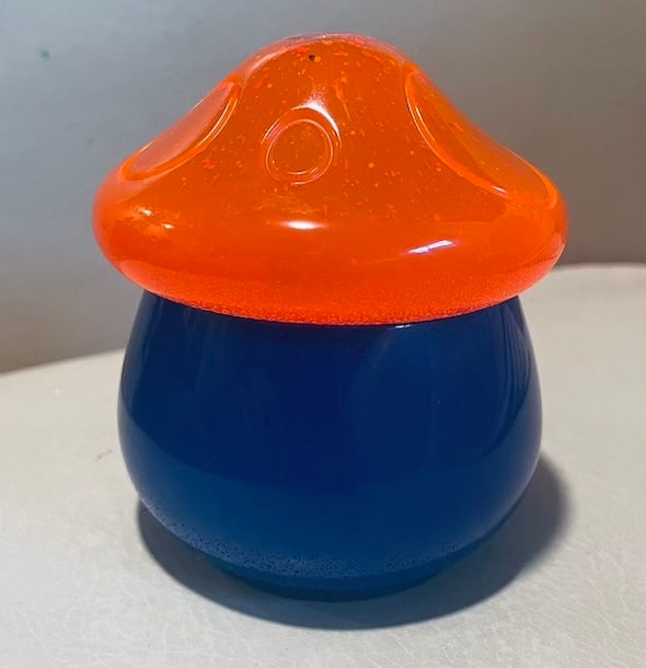 Thumbnail: orange and blue mushroom