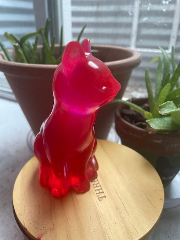 red cat figurine