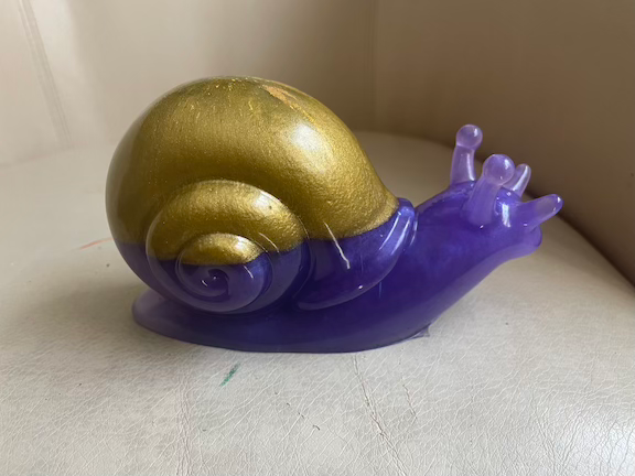 Thumbnail: snail figurine purple and gold