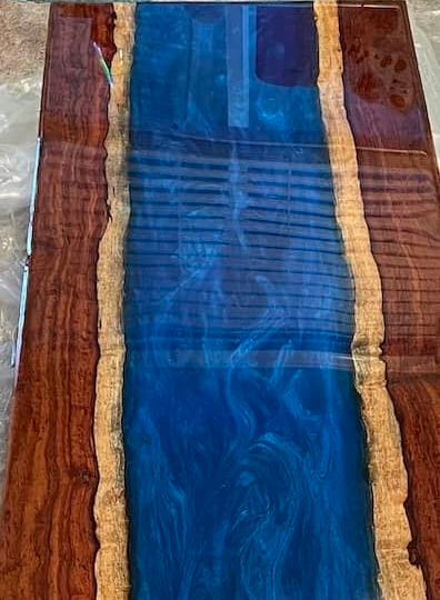 blue resin river live edge table
