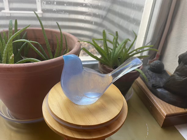 Thumbnail: clear bird figurine