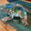 Thumbnail: Clear glass resin frog with blue flowers