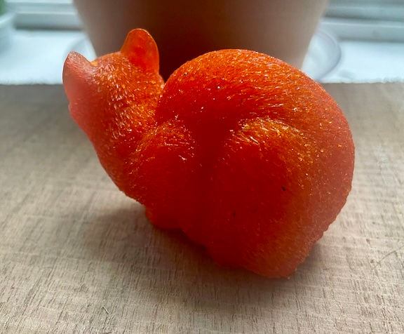 Thumbnail: orange cat figurine