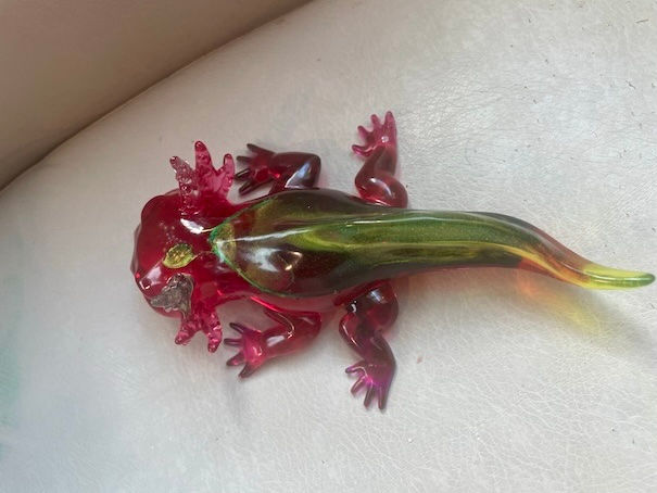 Thumbnail: Red and yellow resin axoltl