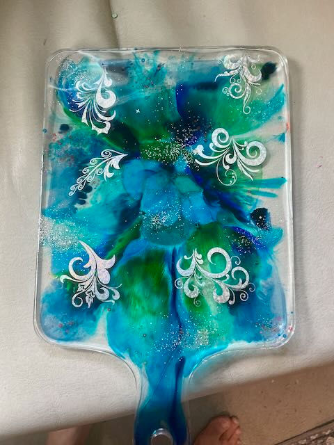 Blue and Green Charcuterie Board with silver decorations