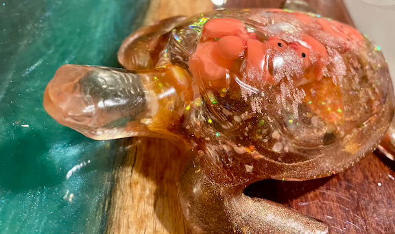 Thumbnail: Resin turtle orange with duck figurines inside