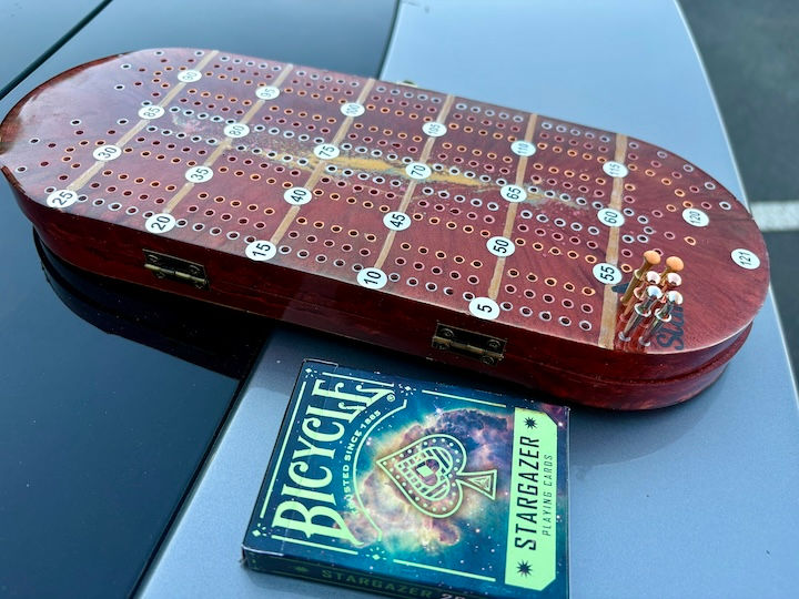 Thumbnail: cribbage board