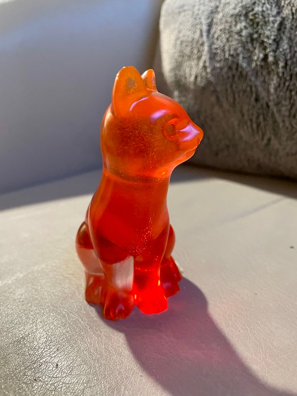 red resin cat