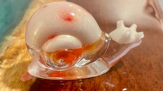 Thumbnail: Clear, white and red decorative snail