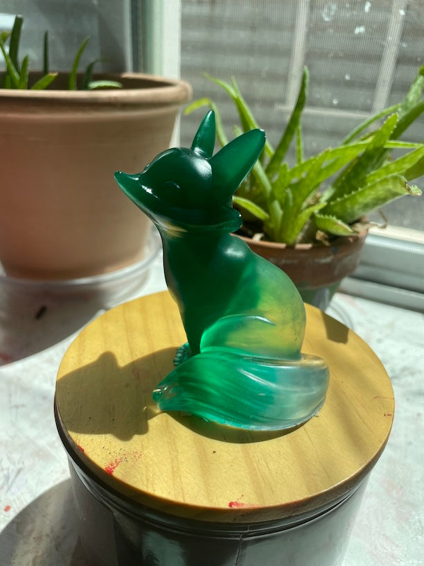 Thumbnail: greenand clear resin fox