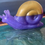 Thumbnail: purple and gold glass snail