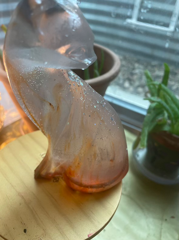 Thumbnail: Clear with orange highlights cat figurine