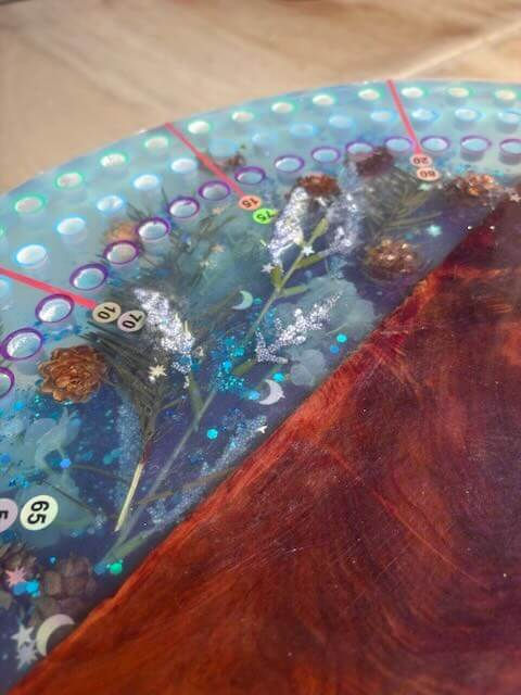 Thumbnail: 20" Resin & Wood Cribbage Board with Pine Cones, Stars