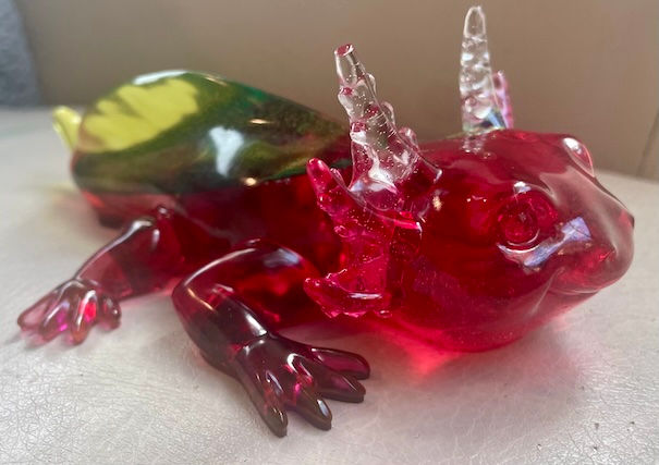 Thumbnail: Red and yellow resin axoltl