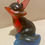 Thumbnail: fox figurine blue and red