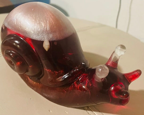 Thumbnail: snail figurine