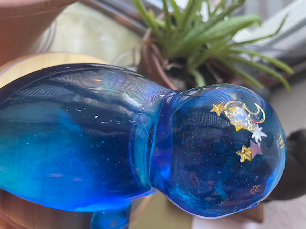 Thumbnail: Translucent blue glass resin seal