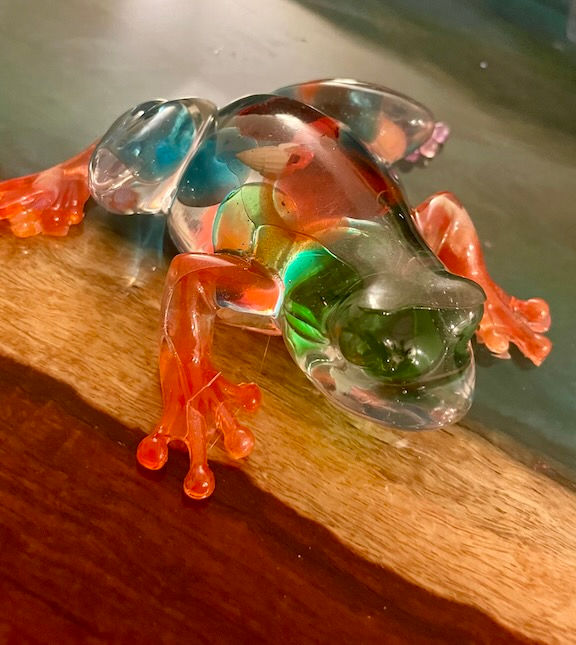 Decorative resin frog with blue, green and red translucent stones