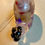 Thumbnail: Snail decoration with purple coloring and white rock