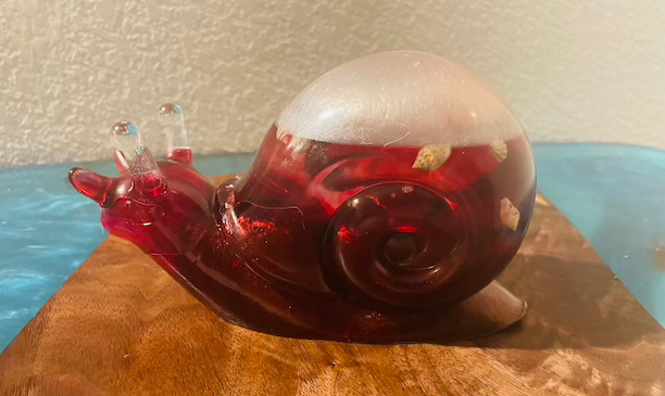 red glass snail