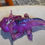 Thumbnail: Purple and red glass resin axolotl