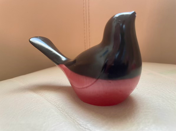 Thumbnail: black red bird decoration