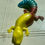 Thumbnail: Yellow, Red, and Teal Decorative Lizard