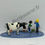 Miniature : FIGURINE PIXI 4772 - LE TRAIN ELECTRIQUE DE GASTON LAGAFFE AVEC SA VACHE ET FANTASIO FRANQUIN
