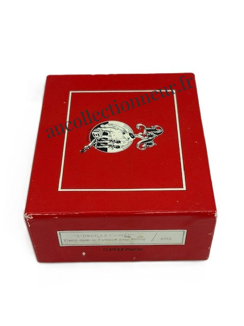 Miniature : FIGURINE PIXI 4502 TINTIN DANS LE FAUTEUIL AVEC MILOU | Au Collectionneur