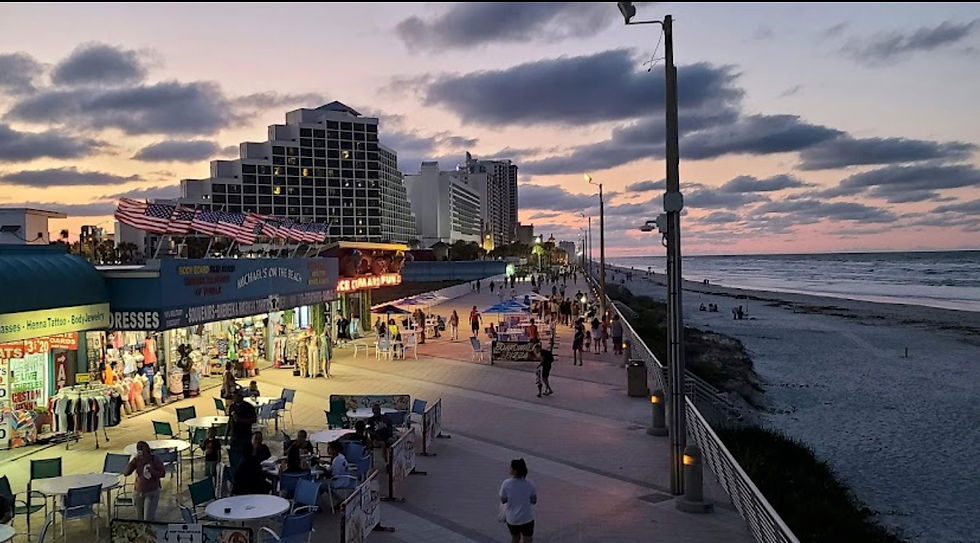 Daytona beach, lively pier with restaurants at sunset