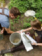 Reece and Taylor measuring fish