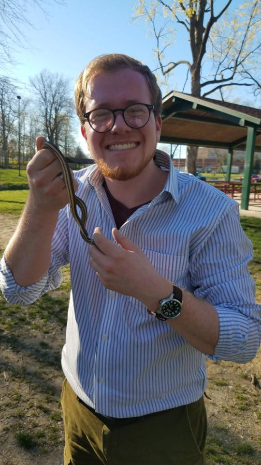 Garret holding a queen snake