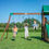 Thumbnail: Lakewood Cedar Wooden Climbing Frame with 3 x Swings and 1 x Slide