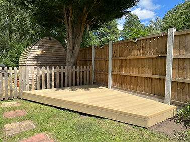 Savanna composite deck with matching fascia in Warrington garden.jpeg
