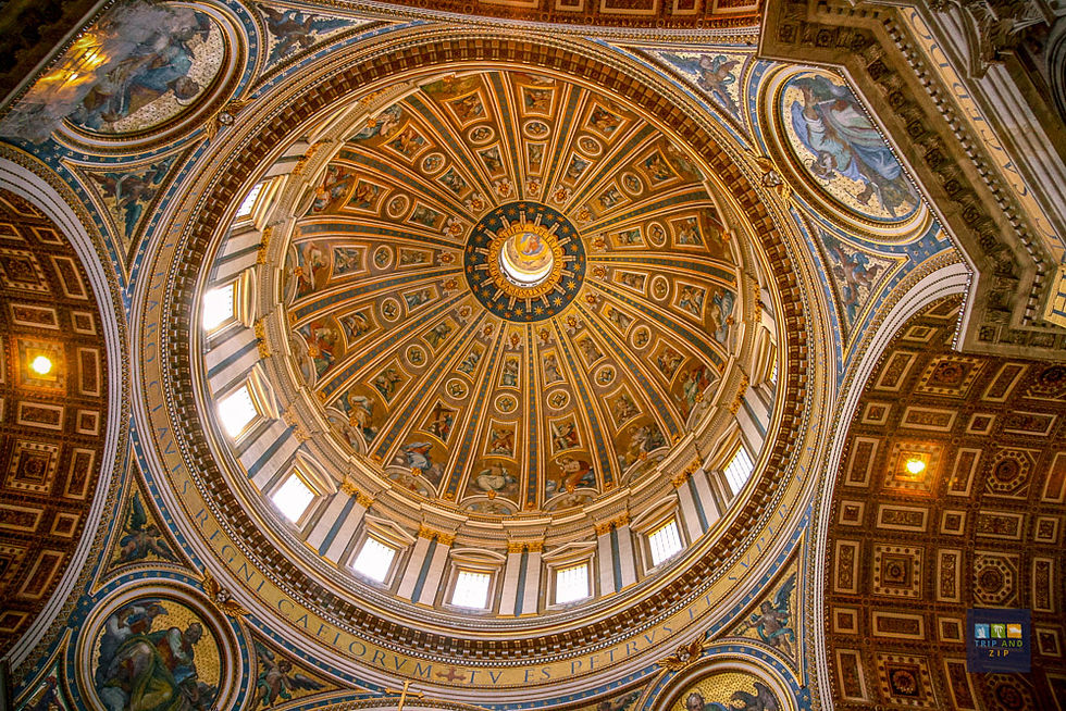 Ornately detailed golden dome interior with religious artwork and Latin text. Sunlight streams through upper windows, creating a serene glow.